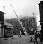 Workmen Drag Gas Cylinders From Mill Blaze (6 of 7)